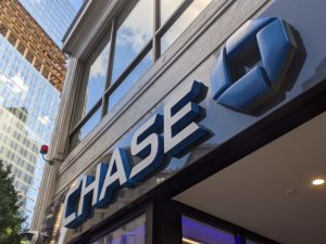 Close-up photo of a Chase Bank sign over the door of a bank branch in Boston