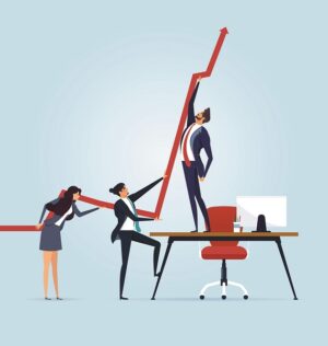 Business people pushing a business graph upwards